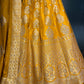 ( DELIVERY IN 25 DAYS ) MUSTARD COLOR BANARASI SILK LEHENGA WITH UNSTITCHED BLOUSE EMBELLISHED WITH ZARI WEAVES