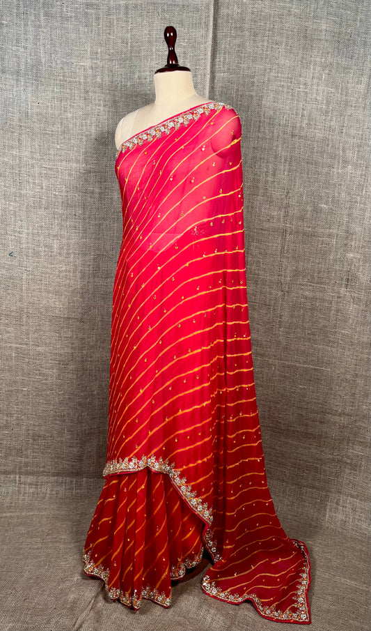 HOT PINK COLOUR CHIFFON LEHARIYA SAREE EMBELLISHED WITH CUTDANA WORK