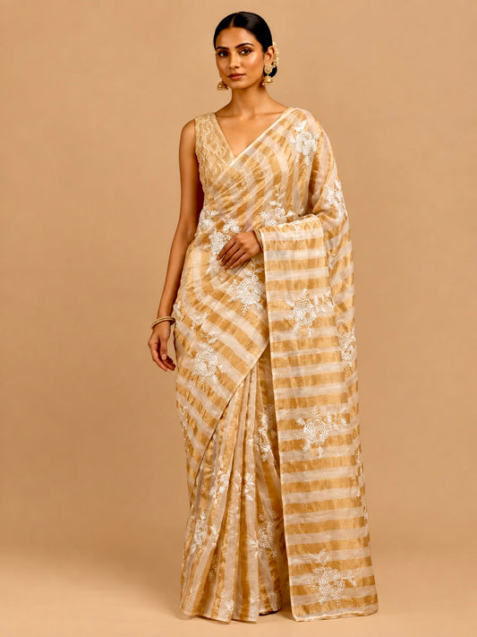 IVORY COLOUR CHANDERI GOLDEN STRIPED PARSI EMBROIDERED SAREE PAIRED WITH AN UNSTITCHED GOLDEN BLOUSE BY SIDDHAIKA