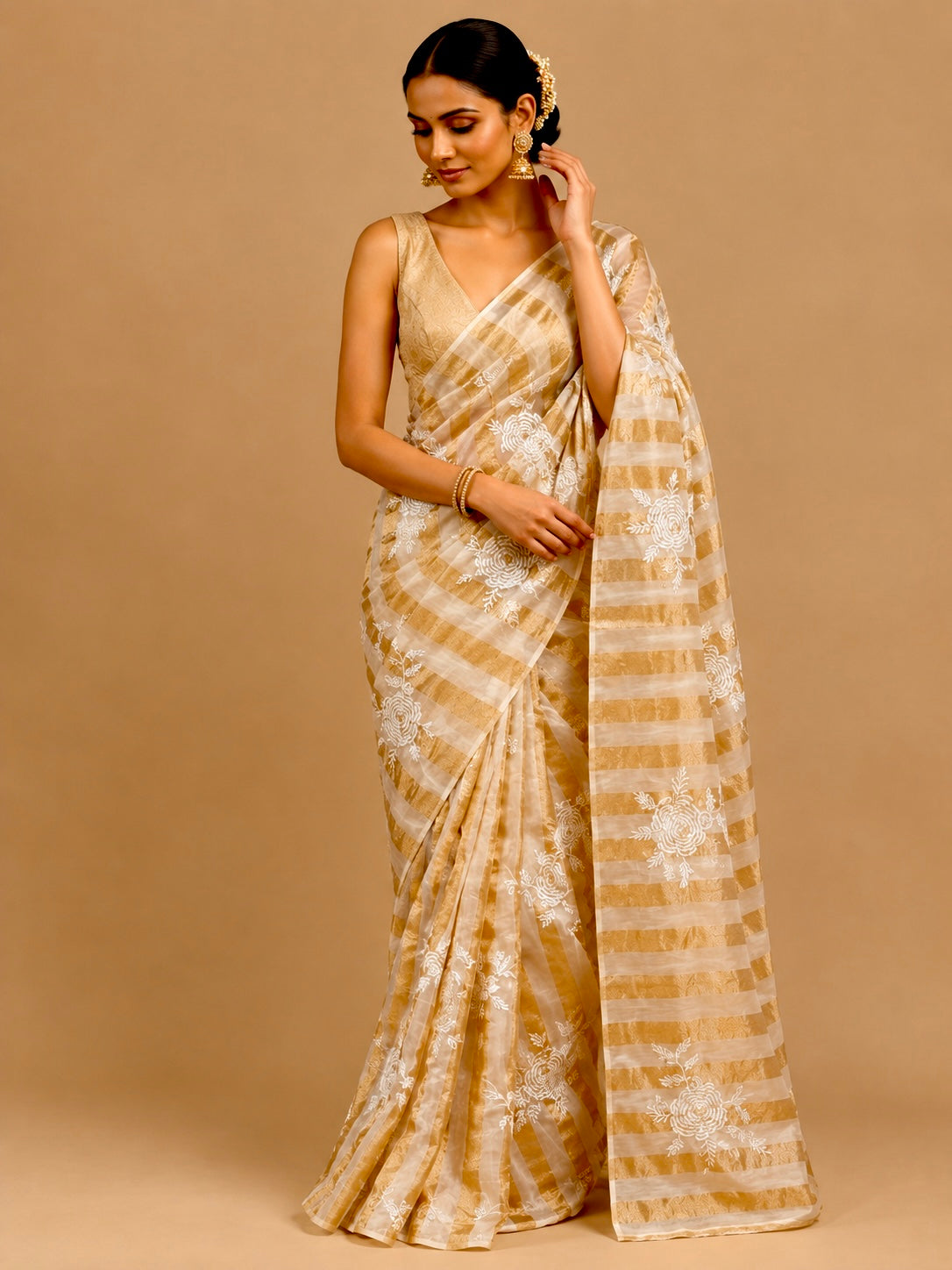 IVORY COLOUR CHANDERI GOLDEN STRIPED PARSI EMBROIDERED SAREE PAIRED WITH AN UNSTITCHED GOLDEN BLOUSE BY SIDDHAIKA - Kothari Sons