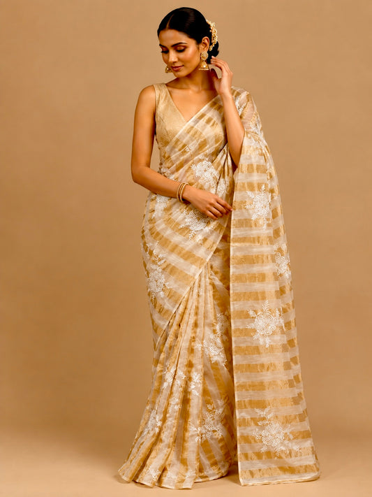 IVORY COLOUR CHANDERI GOLDEN STRIPED PARSI EMBROIDERED SAREE PAIRED WITH AN UNSTITCHED GOLDEN BLOUSE BY SIDDHAIKA