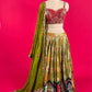 ( DELIVERY IN 25 DAYS ) MEHANDI GREEN COLOUR SKIRT WITH EMBROIDERED CROP TOP BLOUSE & ORGANZA DUPATTA EMBELLISHED WITH RESHAM, CUTDANA & SEQUINS WORK