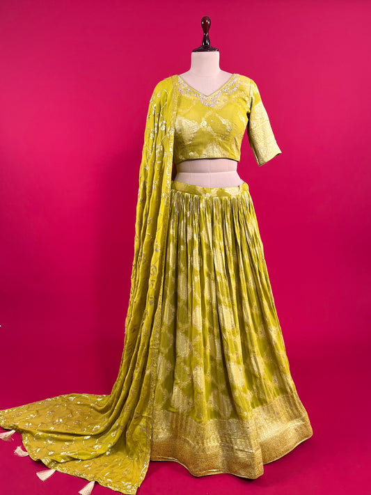 GREEN COLOUR GEORGETTE BANARASI LEHENGA WITH CHINON EMBROIDERED DUPATTA EMBELLISHED WITH SEQUINS WORK
