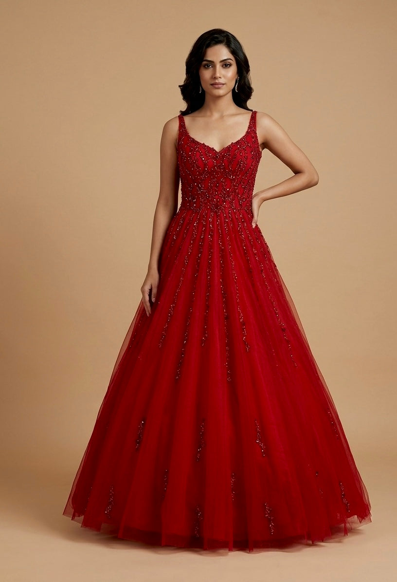 RED COLOUR HAND EMBROIDERED NET BALL GOWN EMBELLISHED WITH SEQUINS, CUTDANA & BEADS WORK