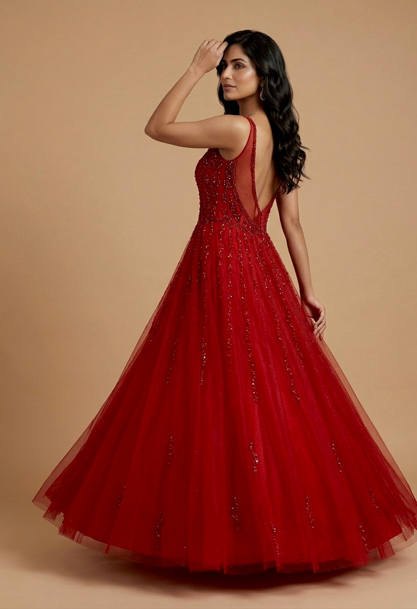 RED COLOUR HAND EMBROIDERED NET BALL GOWN EMBELLISHED WITH SEQUINS, CUTDANA & BEADS WORK