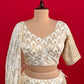 OFF WHITE COLOUR BANARASI LEHENGA WITH READYMADE BLOUSE & CHINON DUPATTA EMBELLISHED WITH SEQUINS WORK