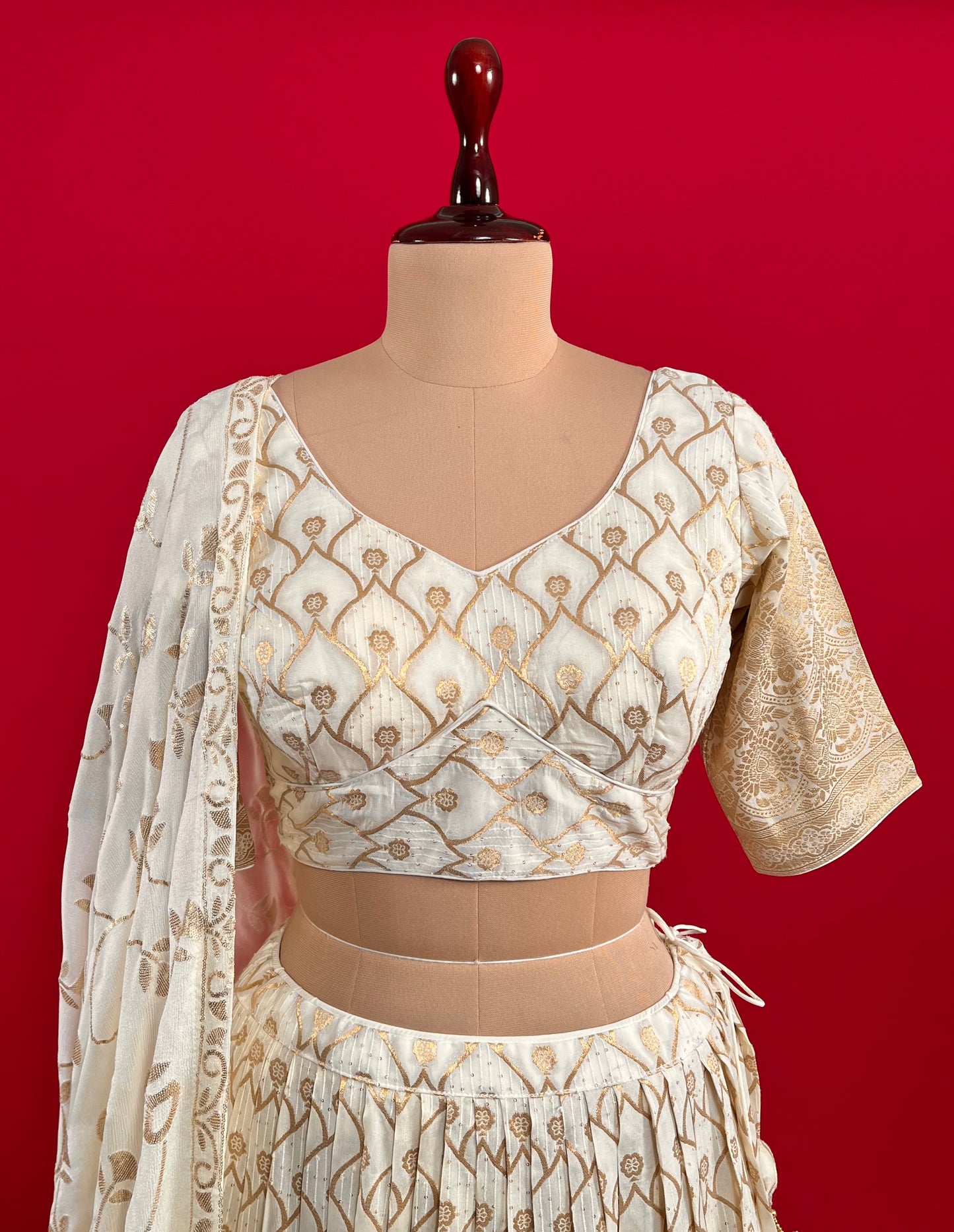 OFF WHITE COLOUR BANARASI LEHENGA WITH READYMADE BLOUSE & CHINON DUPATTA EMBELLISHED WITH SEQUINS WORK