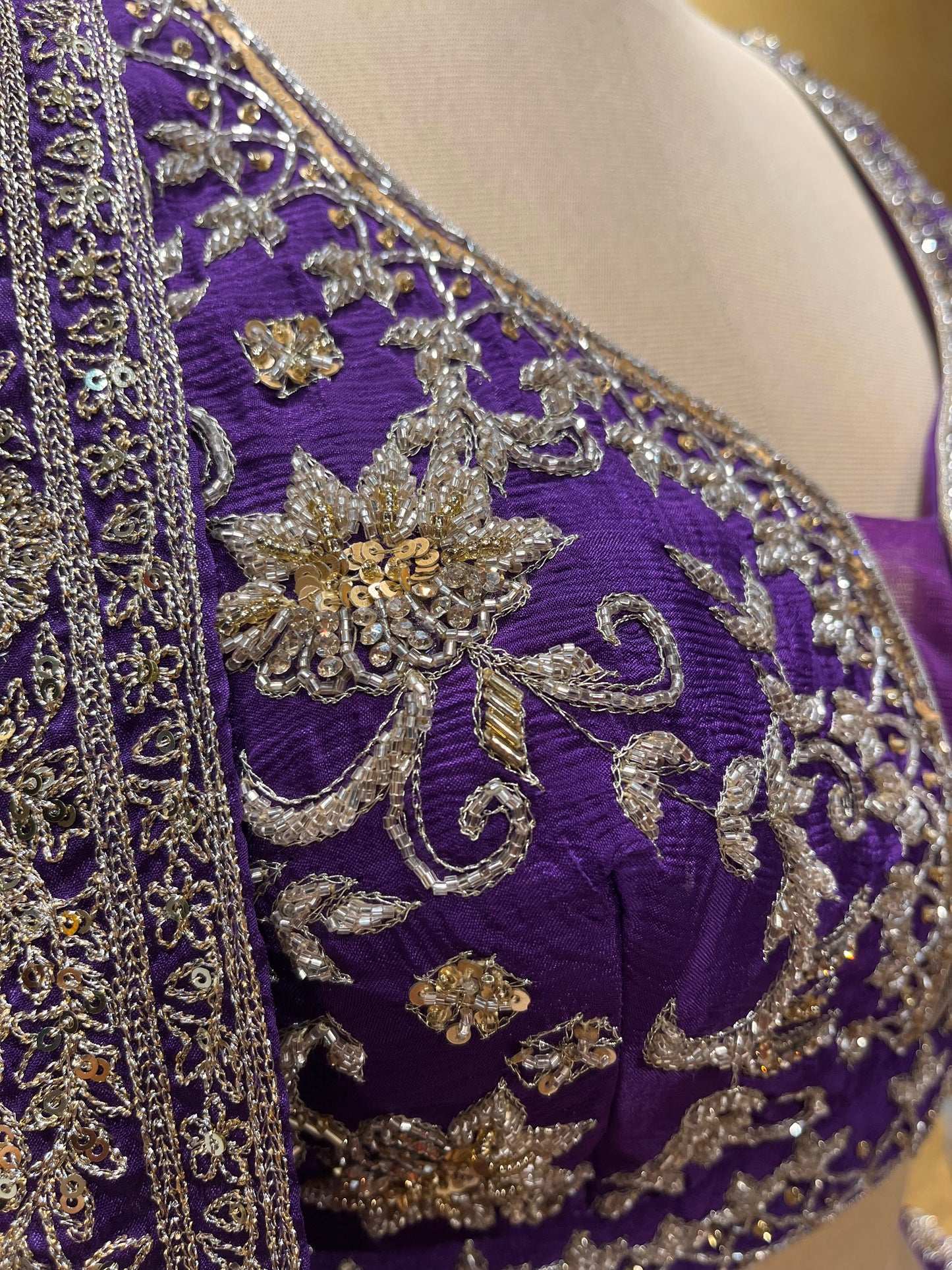 (DELIVERY IN 25 DAYS) PURPLE COLOUR CHINON EMBROIDERED LEHENGA WITH CROP TOP BLOUSE EMBELLISHED WITH CUTDANA & ZARI WORK