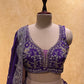 (DELIVERY IN 25 DAYS) PURPLE COLOUR CHINON EMBROIDERED LEHENGA WITH CROP TOP BLOUSE EMBELLISHED WITH CUTDANA & ZARI WORK