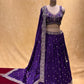 (DELIVERY IN 25 DAYS) PURPLE COLOUR CHINON EMBROIDERED LEHENGA WITH CROP TOP BLOUSE EMBELLISHED WITH CUTDANA & ZARI WORK