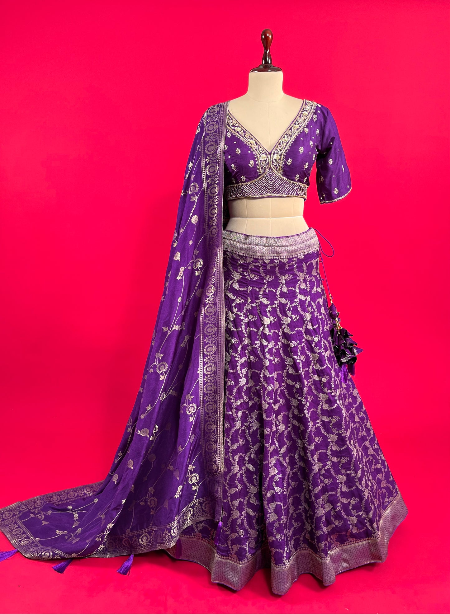 PURPLE COLOUR BANARASI SILK LEHENGA WITH READYMADE EMBROIDERED BLOUSE EMBELLISHED WITH ZARI WEAVES