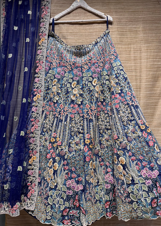 ( DELIVERY IN 25 DAYS ) BLUE COLOR HAND EMBROIDERED NET LEHENGA EMBELLISHED WITH THREAD, SEQUINS & BEADS WORK