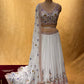 WHITE COLOUR GEORGETTE LEHENGA WITH CROP TOP BLOUSE EMBELLISHED WITH THREAD, SEQUINS & BEADS WORK