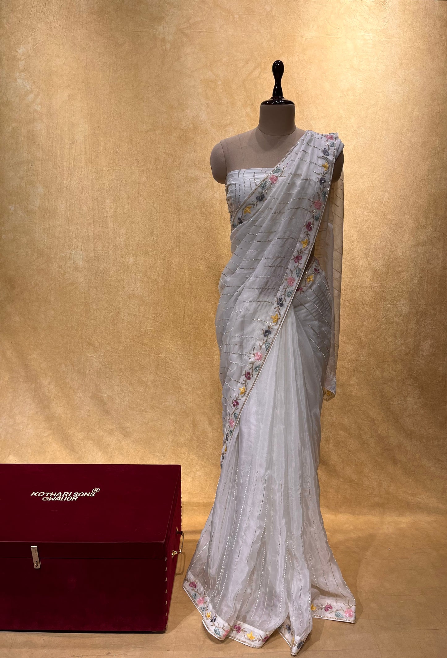 WHITE COLOUR ORGANZA HAND EMBROIDERED SAREE EMBELLISHED WITH SEQUINS, CUTDANA & PEARL WORK