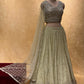 PISTA COLOUR GEORGETTE EMBROIDERED LEHENGA WITH CROP TOP BLOUSE & NET DUPATTA EMBELLISHED WITH MIRROR, PEARL & RESHAM WORK