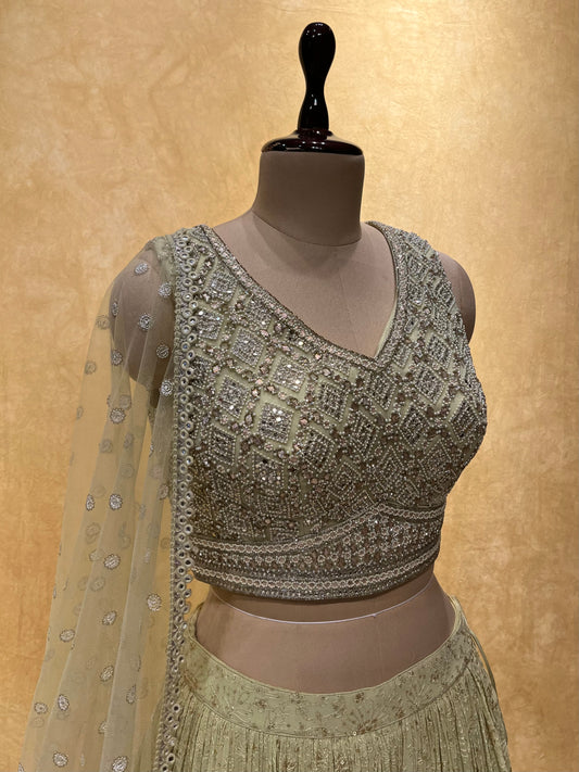 PISTA COLOUR GEORGETTE EMBROIDERED LEHENGA WITH CROP TOP BLOUSE & NET DUPATTA EMBELLISHED WITH MIRROR, PEARL & RESHAM WORK