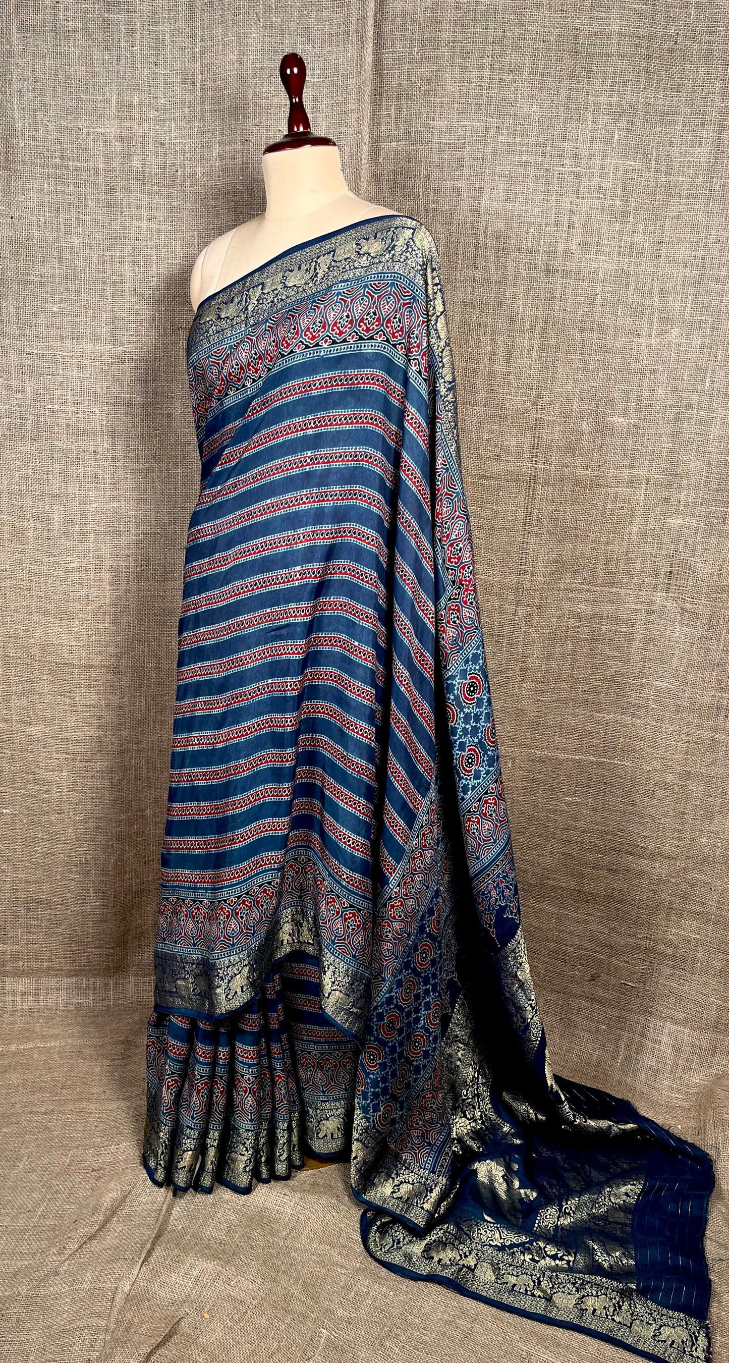 BLUE COLOUR AJRAKH PRINT MODAL SILK SAREE ZARI PALLU & BORDER