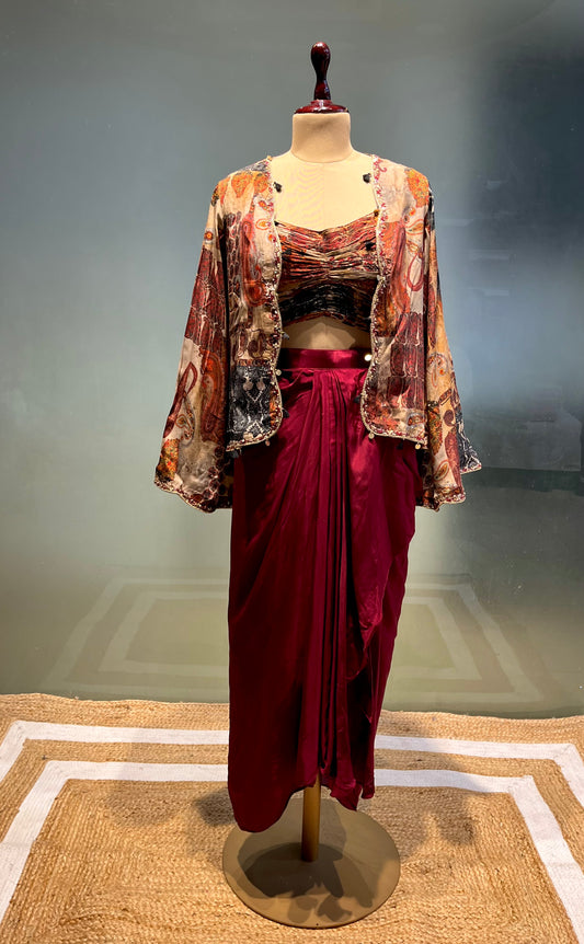 MAROON COLOUR CREPE SILK DHOTI STYLE  SKIRT WITH CROP TOP & JACKET EMBELLISHED WITH CUTDANA WORK