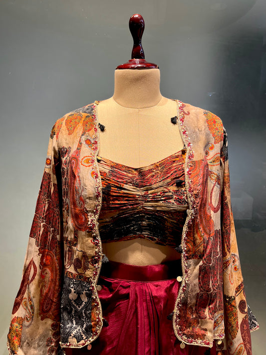 MAROON COLOUR CREPE SILK DHOTI STYLE  SKIRT WITH CROP TOP & JACKET EMBELLISHED WITH CUTDANA WORK