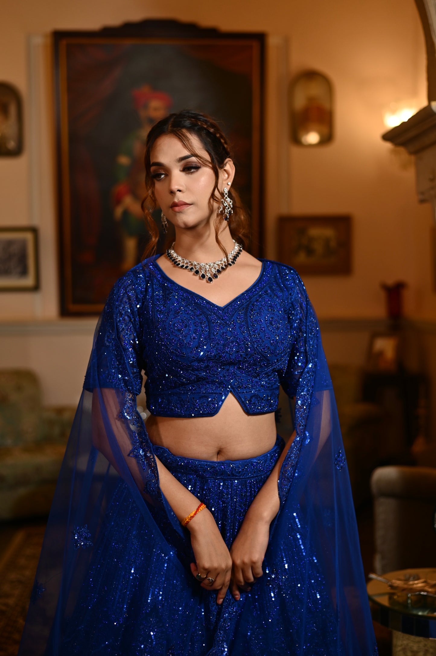 ROYAL BLUE COLOUR NET LEHENGA EMBELLISHED WITH SEQUINS  KUNDUN & RESHAM WORK