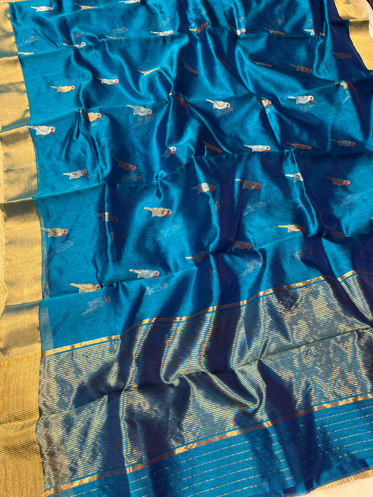 TURQUOISE COLOR CHANDERI PATTU SILK SAREE EMBELLISHED WITH ZARI WEAVES