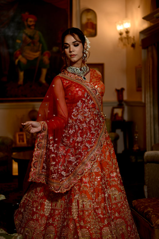 ORANGE COLOUR HAND EMBROIDERD BRIDAL SILK LEHENGA WITH CONTRAST DUPATTA WITH ZARDOZI WORK