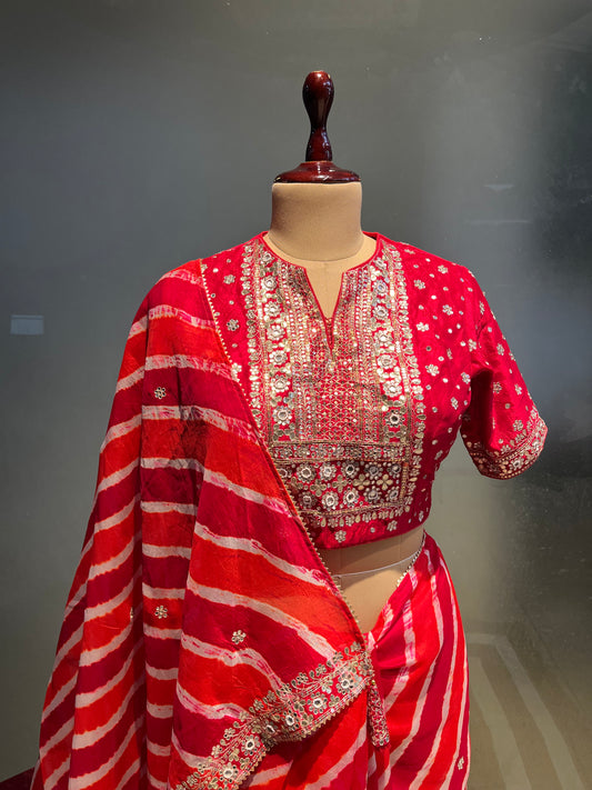 RED & ORANGE COLOUR SILK LEHERIYA SAREE WITH EMBROIDERED BLOUSE EMBELLISHED WITH GOTA PATTI & MIRROR WORK