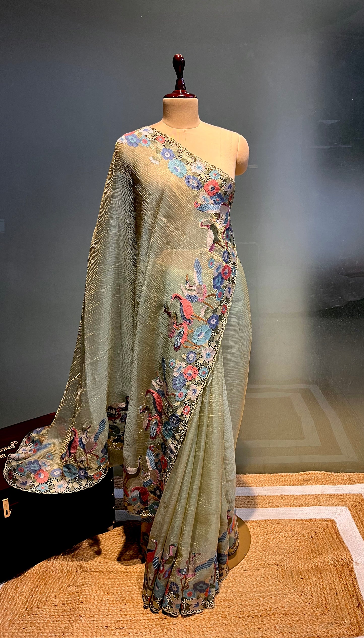 PASTEL GREEN COLOUR CRUSHED TISSUE EMBROIDERED SAREE EMBELLISHED WITH THREAD WORK