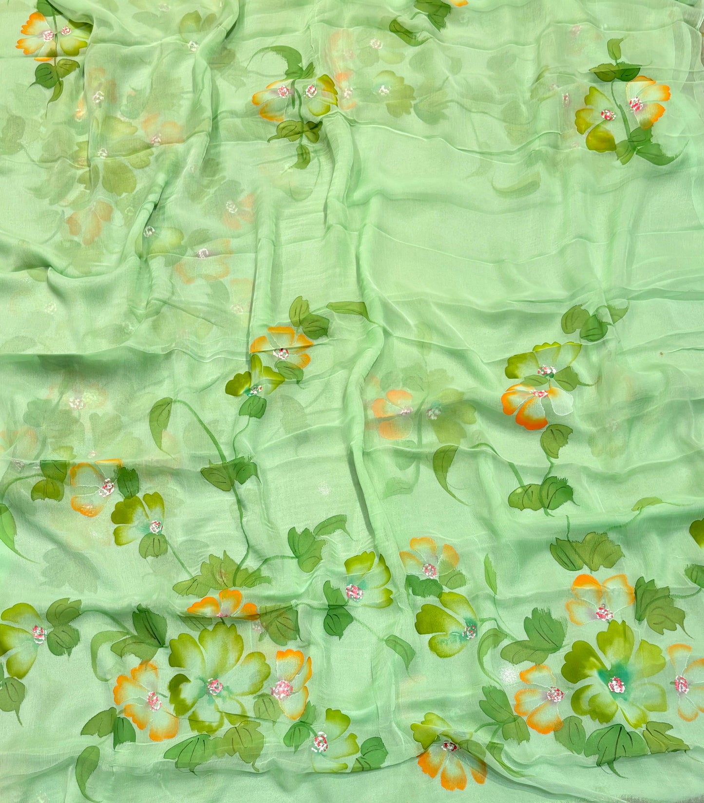 MINT GREEN HAND-PAINTED CHIFFON SAREE WITHOUT BLOUSE( DELIVERY IN 25 DAYS )
