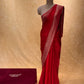 (DELIVERY IN 25 DAYS ) RED COLOR JACQUARD SATIN SILK SAREE EMBELLISHED WITH ZARI BORDER & PALLA