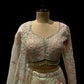 SEA GREEN NET EMBROIDERED LEHENGA WITH READYMADE BLOUSE EMBELLISHED WITH SEQUINS PEARL & STONE WORK