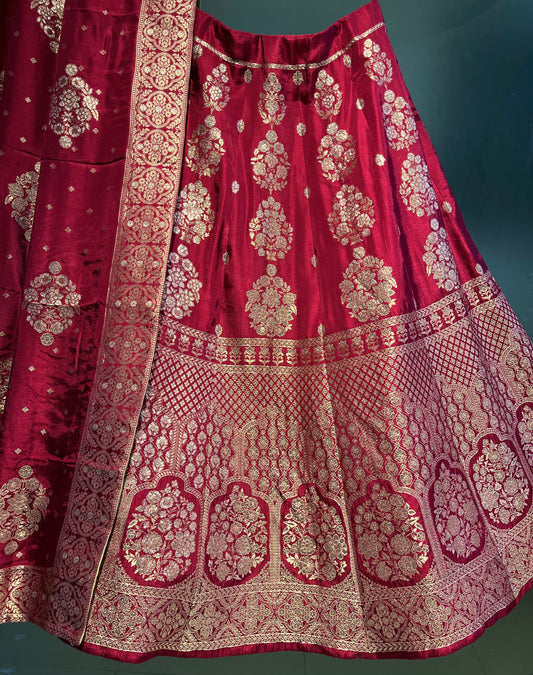 ( DELIVERY IN 25 DAYS ) MAROON COLOUR BANARASI SILK LEHENGA WITH UNSTITCHED BLOUSE EMBELLISHED WITH ZARI WEAVES