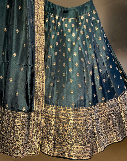 ( DELIVERY IN 25 DAYS ) TEAL BLUE COLOUR BANARASI SILK LEHENGA WITH UNSTITCHED BLOUSE EMBELLISHED WITH ZARI WEAVES