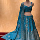 ( DELIVERY IN 25 DAYS ) TURQUOISE COLOUR BANARASI PURE SILK LEHENGA WITH UNSTITCHED BLOUSE EMBELLISHED WITH ZARIWEAVES