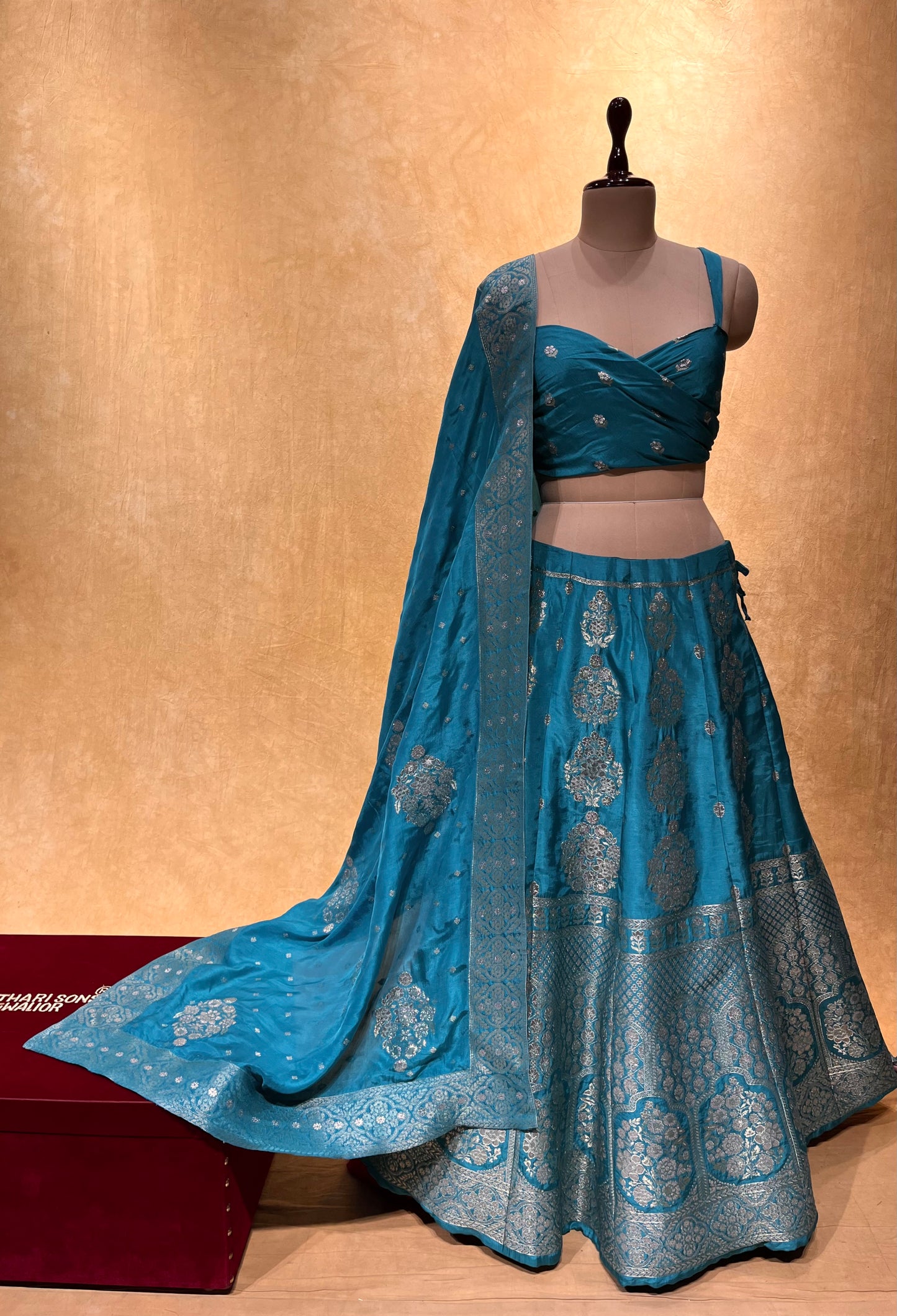 ( DELIVERY IN 25 DAYS ) TURQUOISE COLOUR BANARASI PURE SILK LEHENGA WITH UNSTITCHED BLOUSE EMBELLISHED WITH ZARIWEAVES