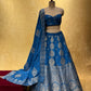 ( DELIVERY IN 25 DAYS ) BLUE COLOUR BANARASI PURE SILK LEHENGA WITH UNSTITCHED BLOUSE EMBELLISHED WITH ZARI WEAVES