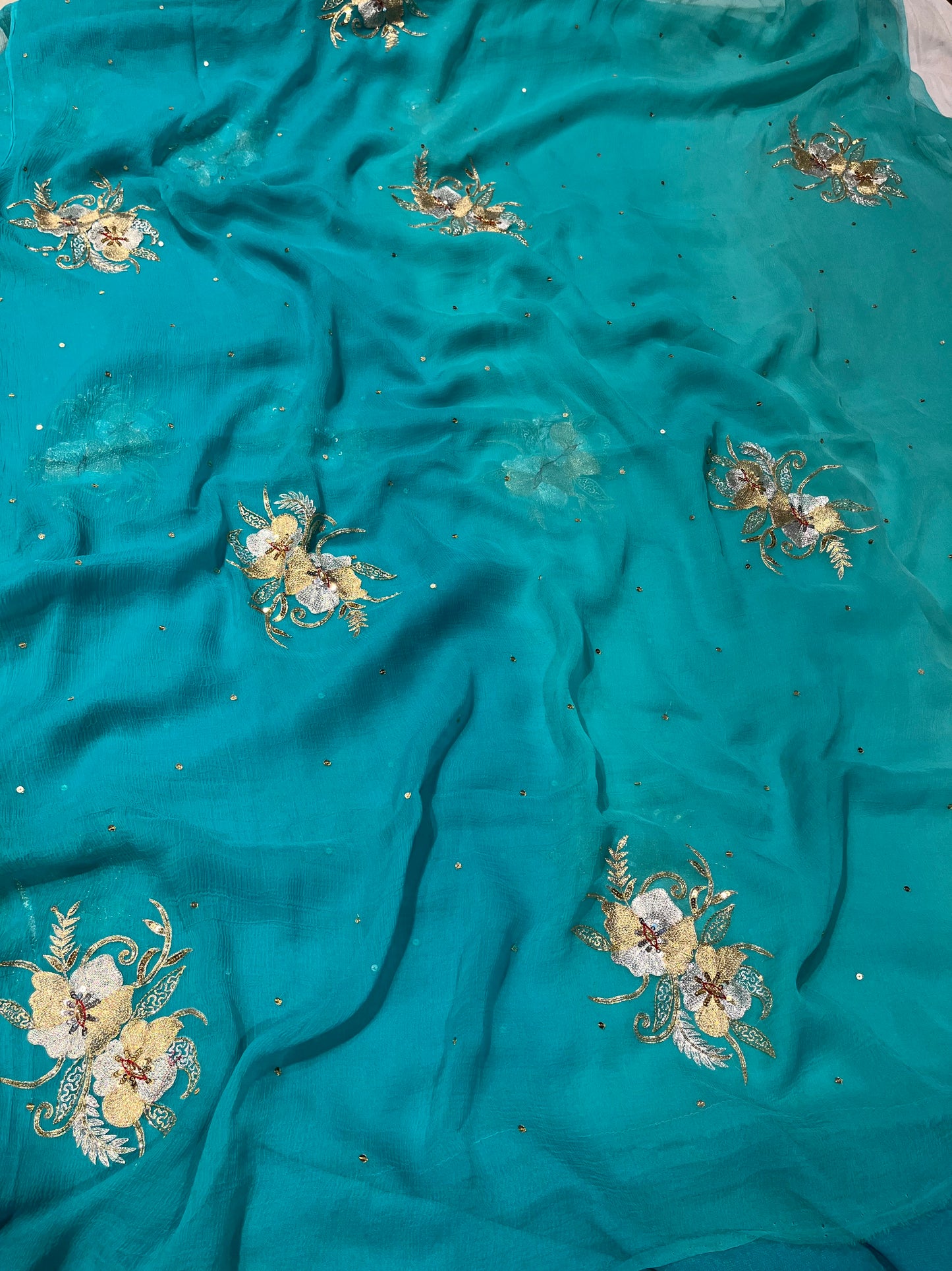 TURQUOISE BLUE SHADED CHIFFON HAND EMBROIDERED SAREE EMBELLISHED WITH AARI & SEQUINS WORK ( DELIVERY IN 25-30 DAYS ) - Kothari Sons