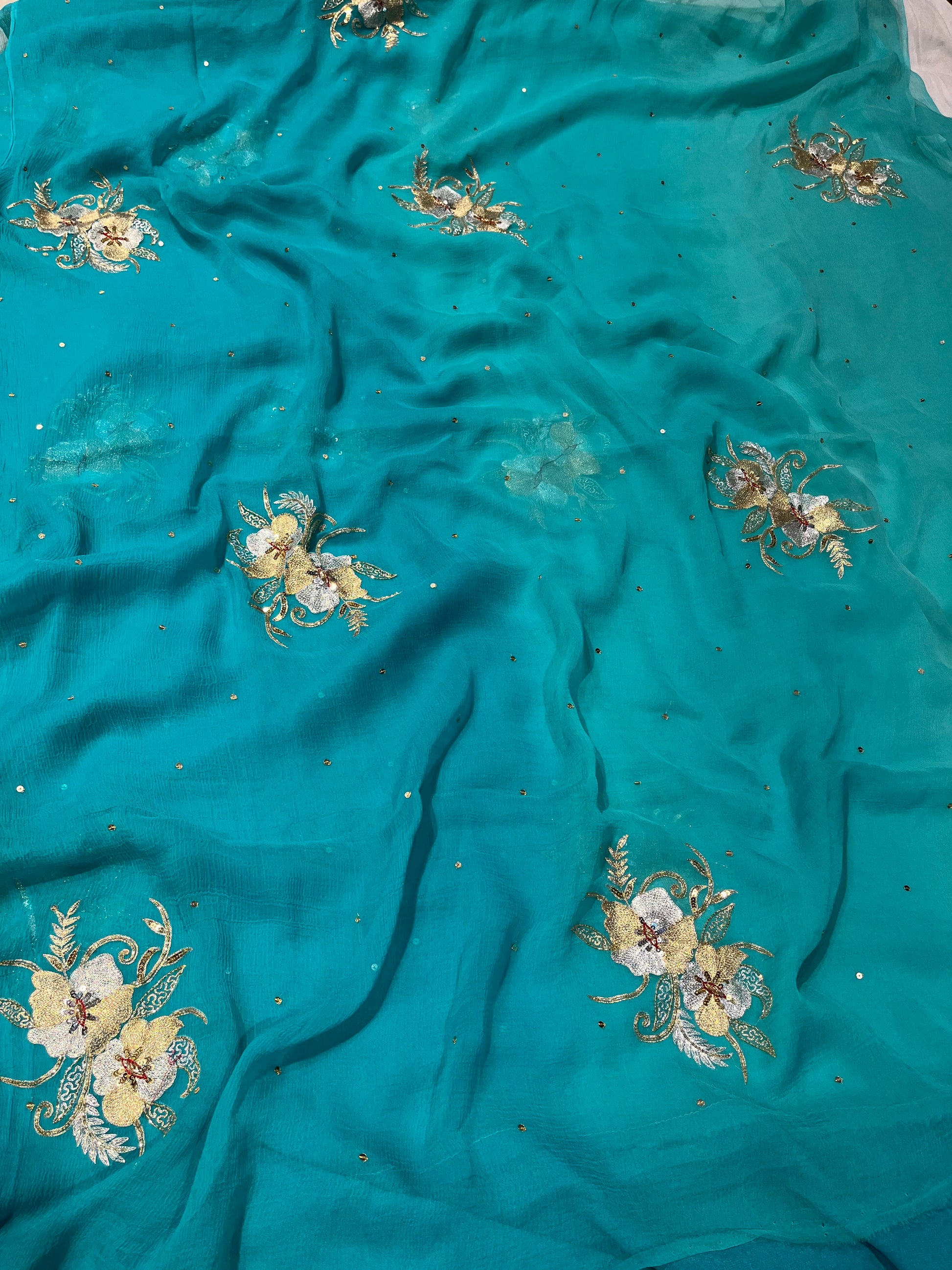 TURQUOISE BLUE SHADED CHIFFON HAND EMBROIDERED SAREE EMBELLISHED WITH AARI & SEQUINS WORK ( DELIVERY IN 25-30 DAYS ) - Kothari Sons