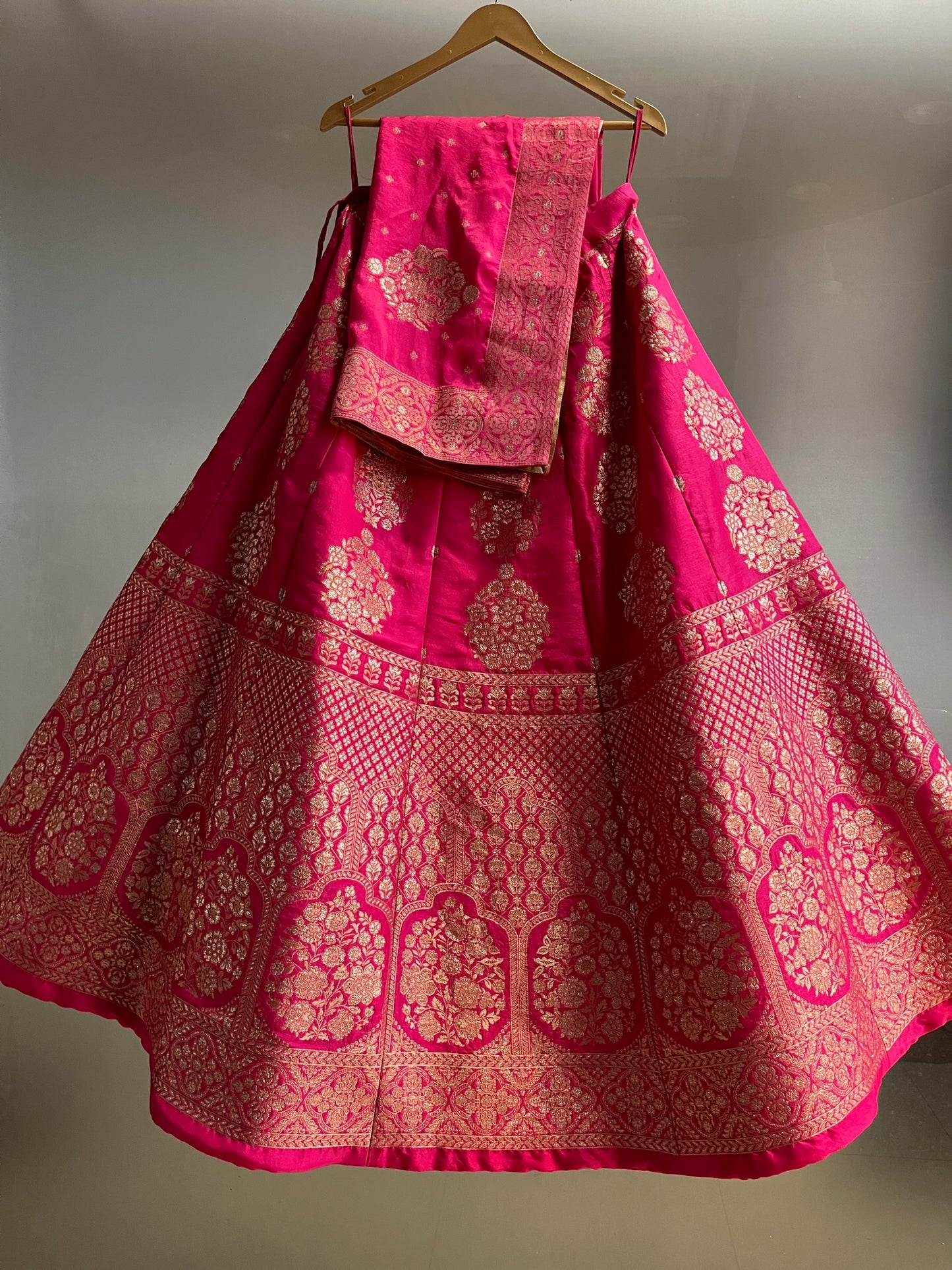 ( DELIVERY IN 25 DAYS ) HOT PINK COLOUR BANARASI PURE SILK LEHENGA WITH UNSTITCHED BLOUSE EMBELLISHED WITH ZARI WEAVES