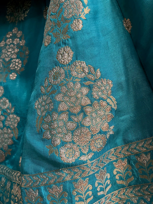 ( DELIVERY IN 25 DAYS ) TURQUOISE COLOUR BANARASI PURE SILK LEHENGA WITH UNSTITCHED BLOUSE EMBELLISHED WITH ZARIWEAVES