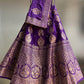 ( DELIVERY IN 25 DAYS ) VIOLET COLOUR BANARASI PURE SILK LEHENGA WITH UNSTITCHED BLOUSE EMBELLISHED WITH ZARI WEAVES