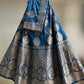 ( DELIVERY IN 25 DAYS ) BLUE COLOUR BANARASI PURE SILK LEHENGA WITH UNSTITCHED BLOUSE EMBELLISHED WITH ZARI WEAVES