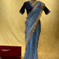 POWDER BLUE COLOUR ORGANZA TISSUE SAREE WITH EMBROIDERED READYMADE BLOUSE