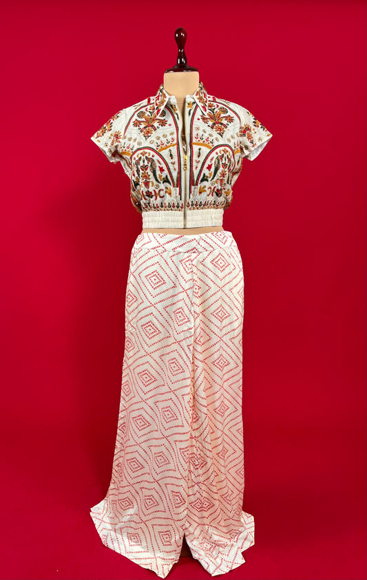 WHITE COLOUR CHINON BANDHANI PRINT PANT WITH CROP TOP & EMBROIDERED JACKET EMBELLISHED WITH SEQUINS & RESHAM EMBROIDERY