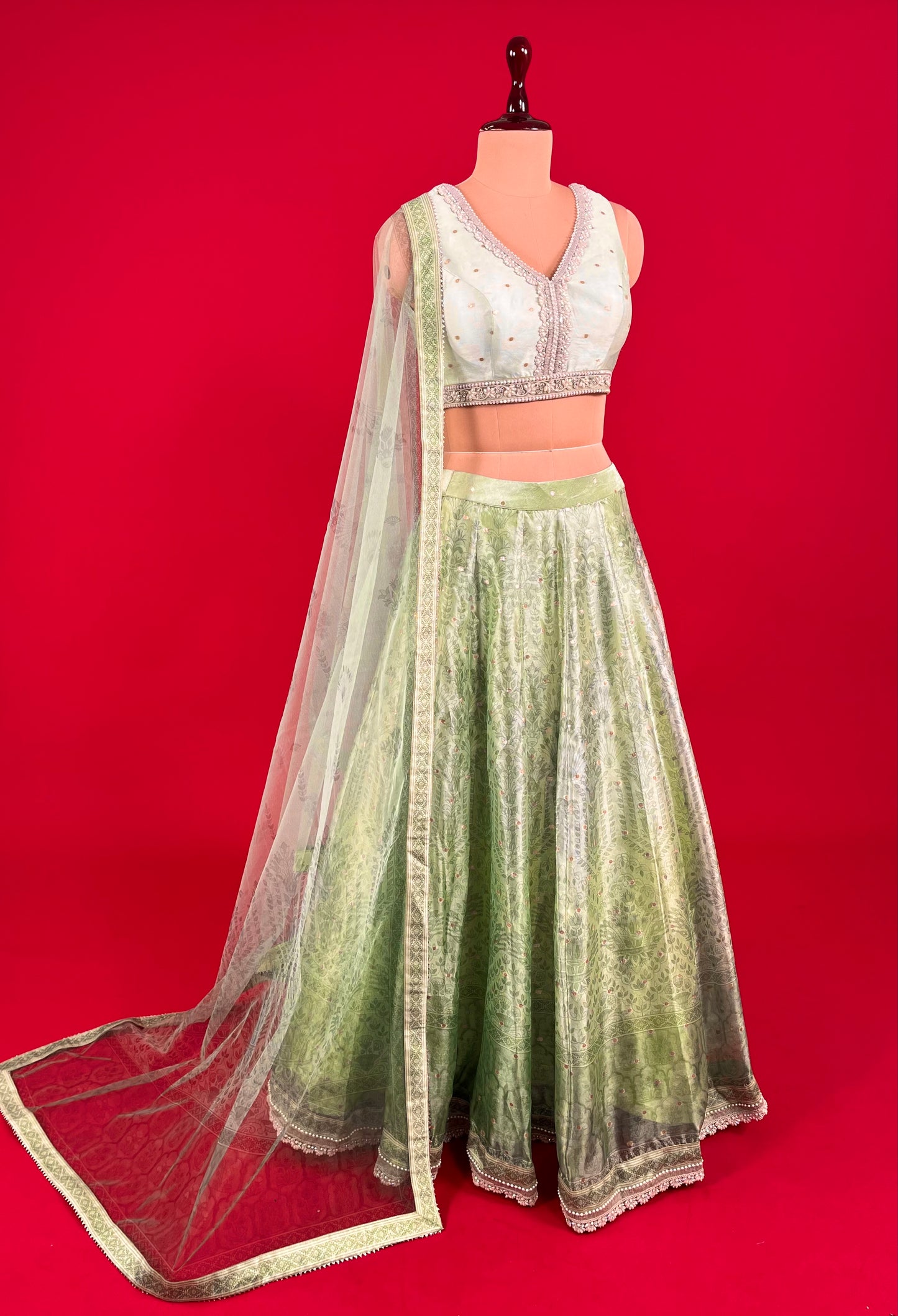 PISTA GREEN COLOUR ORGANZA SKIRT WITH CROP TOP BLOUSE & NET DUPATTA EMBELLISHED WITH PEARL & SEQUINS WORK