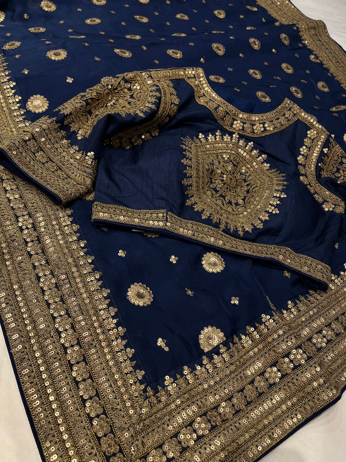 NAVY BLUE COLOUR ORGANZA SILK READYMADE RAW SILK BLOUSE SAREE EMBELLISHED WITH ANTIQUE KASAB, BEADS & SEQUINS WORK