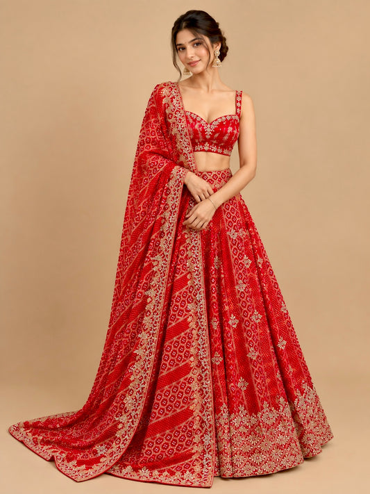 RED COLOUR KHADDI GEORGETTE BANDHANI LEHENGA WITH GOTA PATTI, MIRROR & ZARDOZI WORK & UNSTITCHED BLOUSE