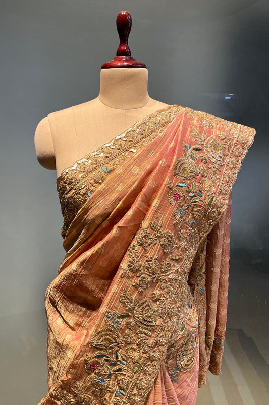 PEACH COLOUR CRUSHED TISSUE EMBROIDERED SAREE EMBELLISHMENT WITH SEQUINS, ZARI & RESHAM EMBROIDERY