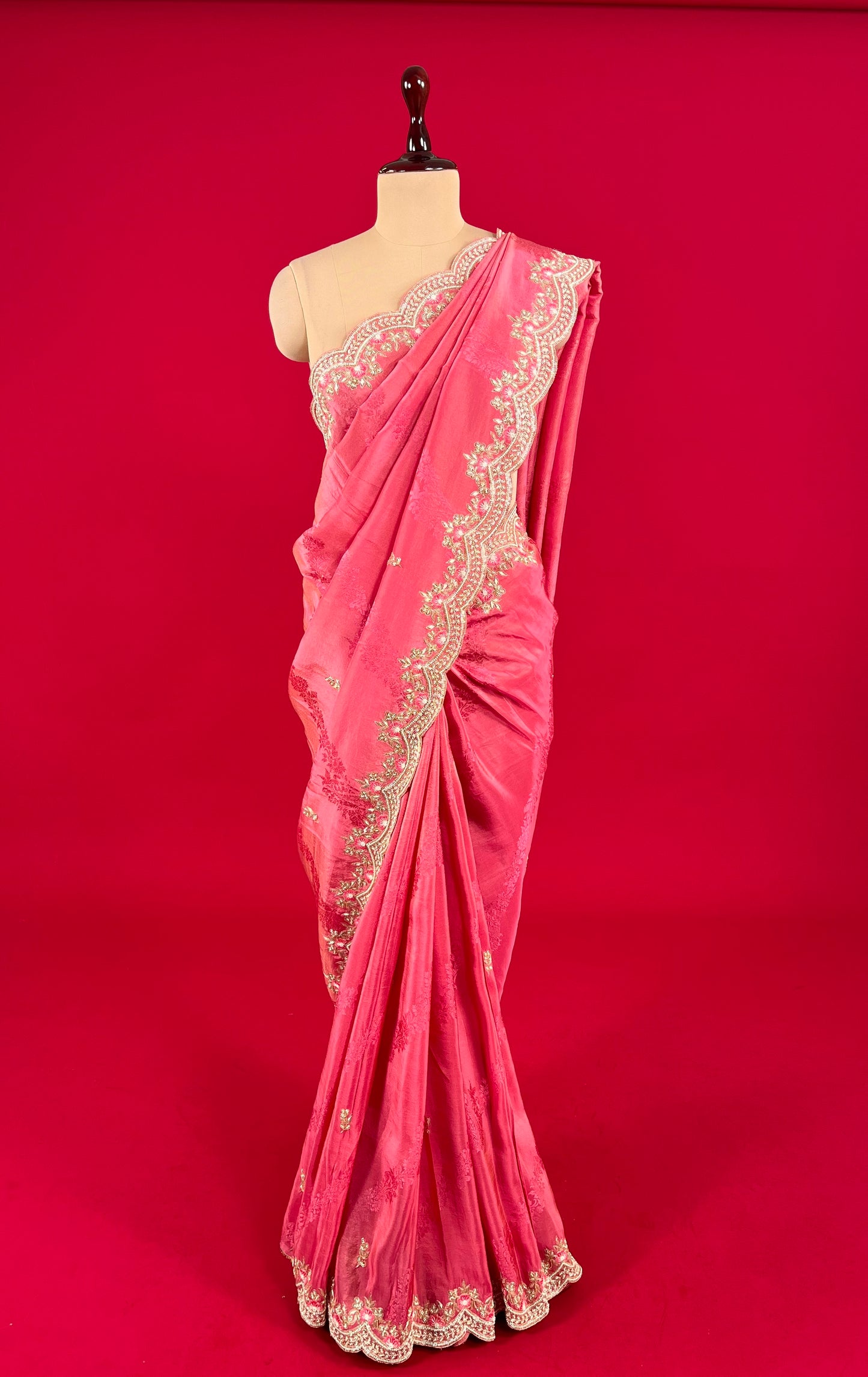 (DELIVERY IN 15-20 DAYS ) PINK COLOUR CREPE TISSUE SCALLOPED BORDER SAREE EMBELLISHED WITH CUTDANA, SEQUINS & ZARDOZI WORK