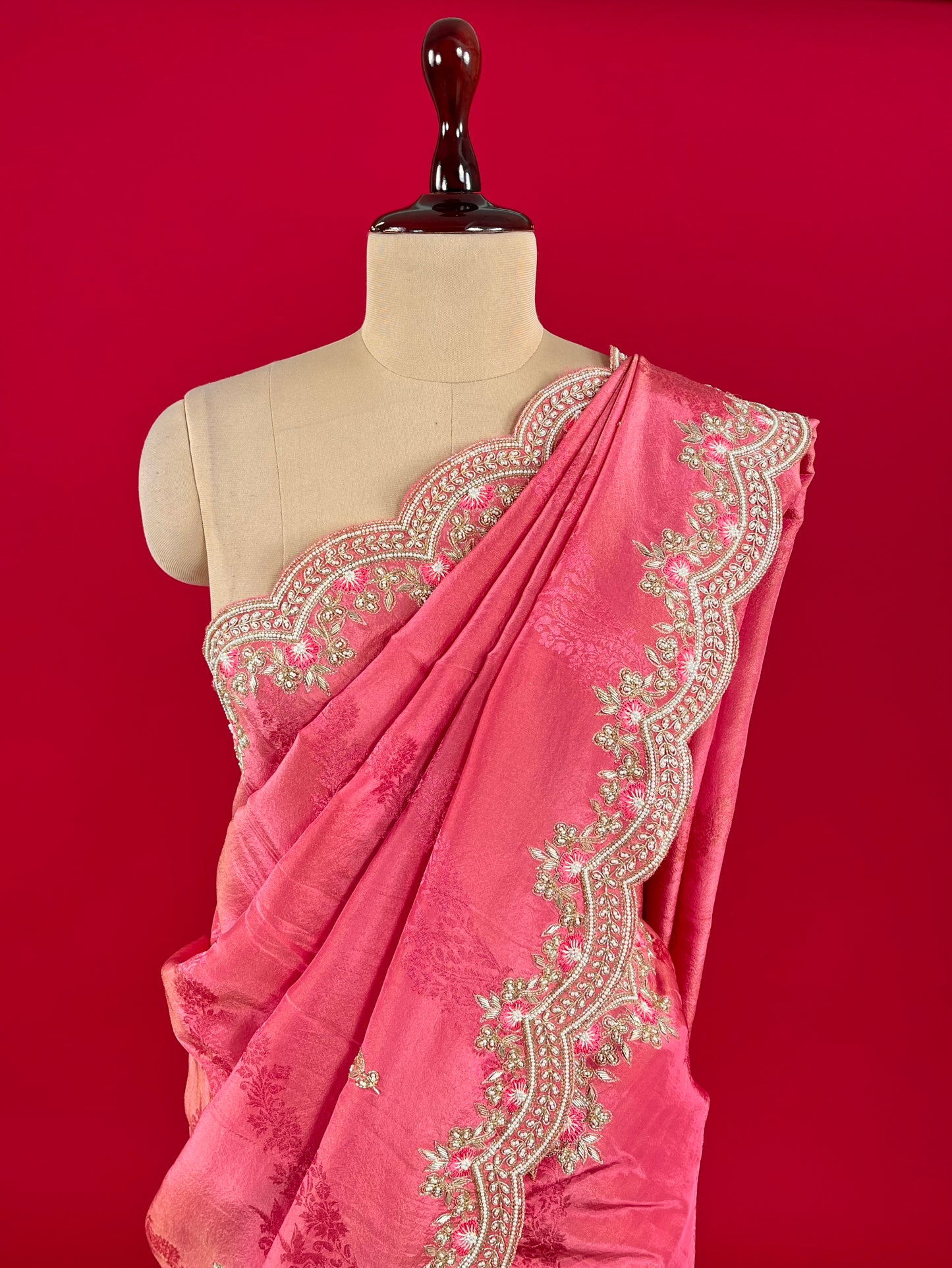 (DELIVERY IN 15-20 DAYS ) PINK COLOUR CREPE TISSUE SCALLOPED BORDER SAREE EMBELLISHED WITH CUTDANA, SEQUINS & ZARDOZI WORK